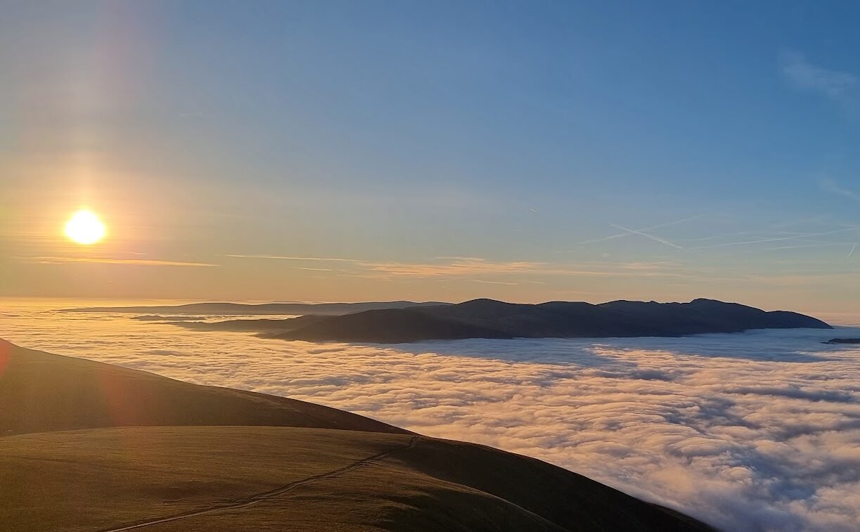 A cloud inversion below Skiddaw in the Lake District